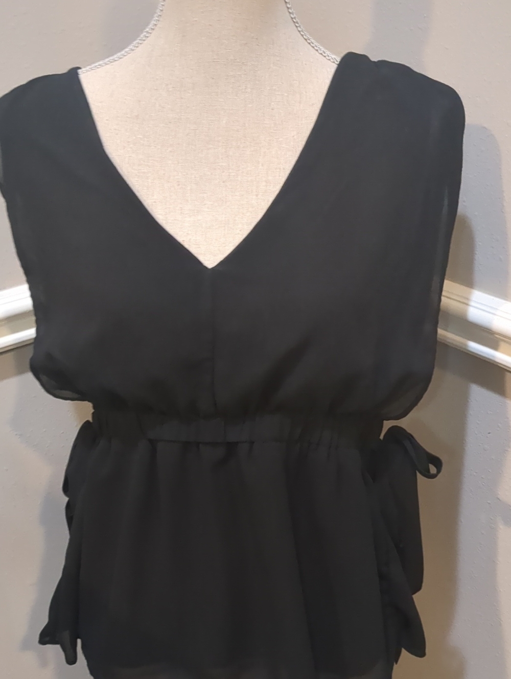 Glam Black V-Neck Sleeveless Peplum Blouse